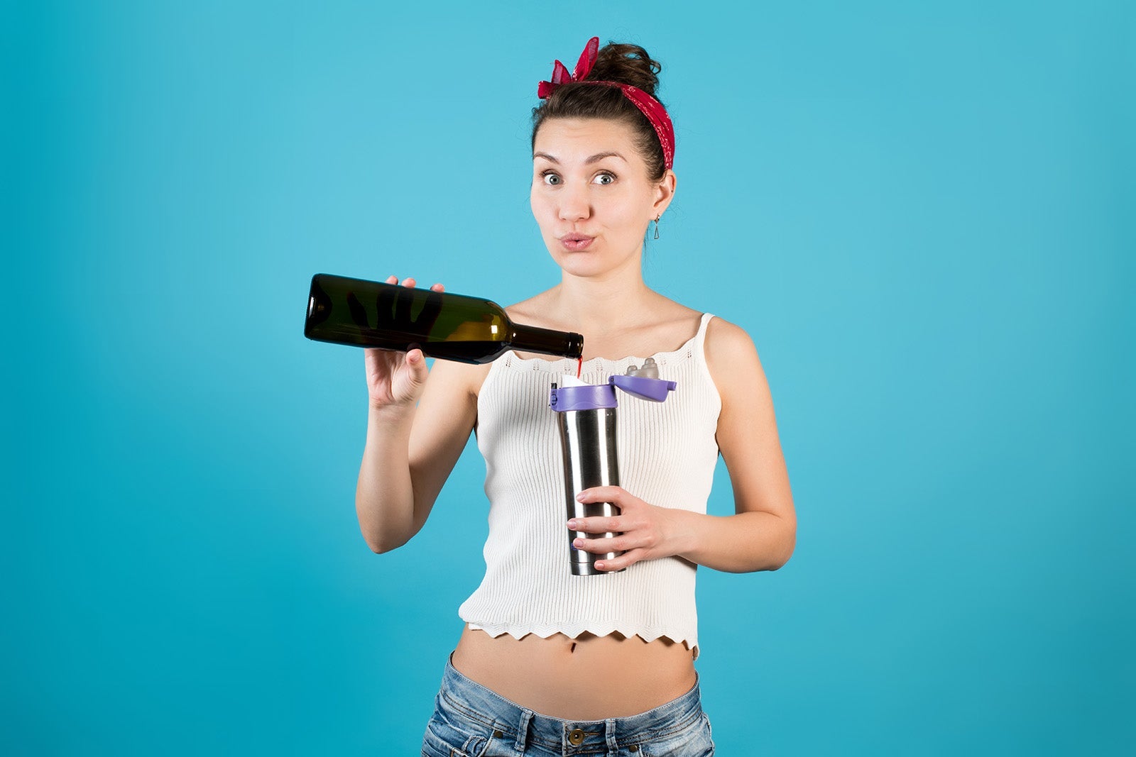 A young woman hides wine in a thermos under the guise of tea.