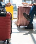 Three suitcases at an airport