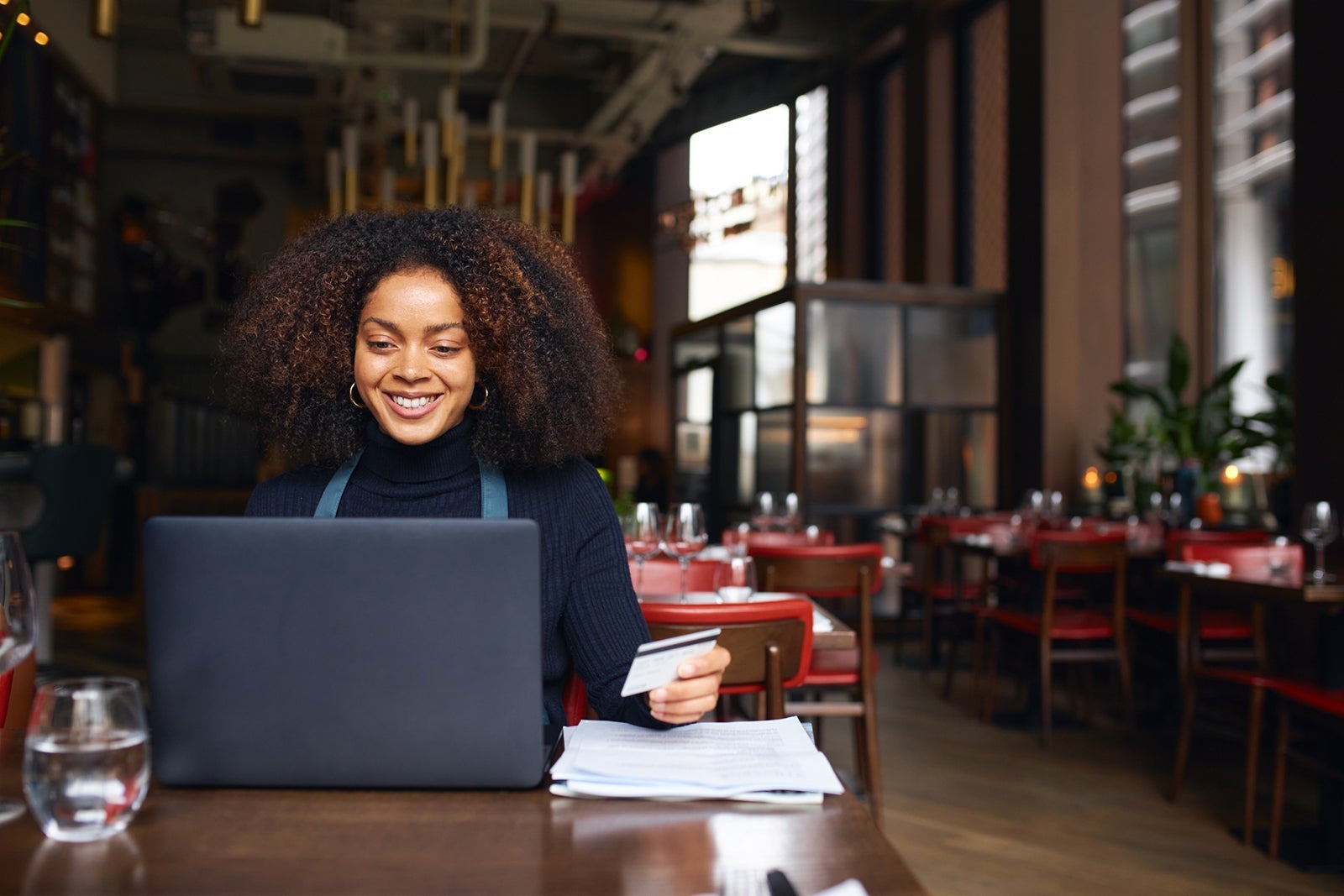 Southwest Performance Business card review: Full details Restaurant owner using laptop