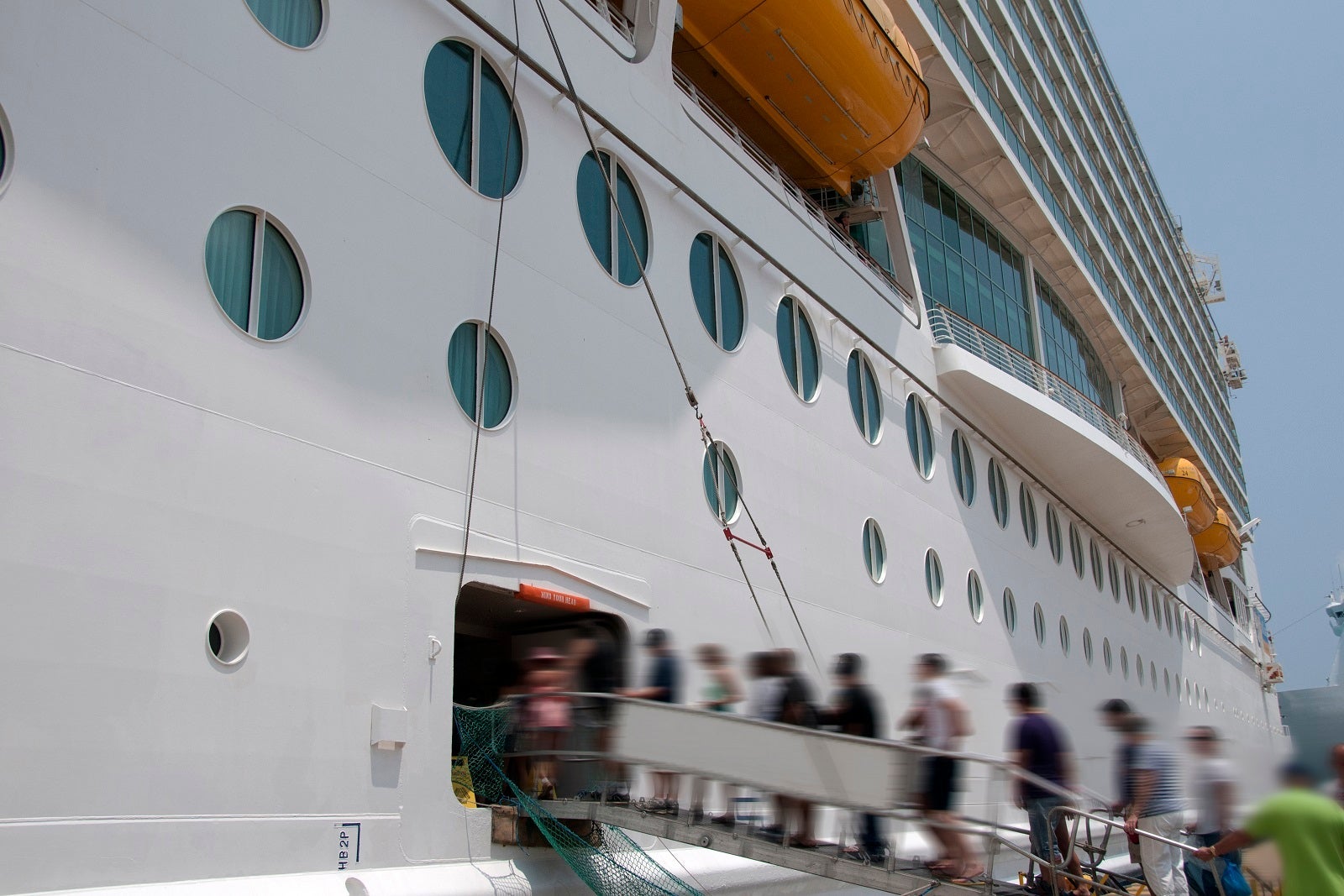 Passengers boarding a cruise ship