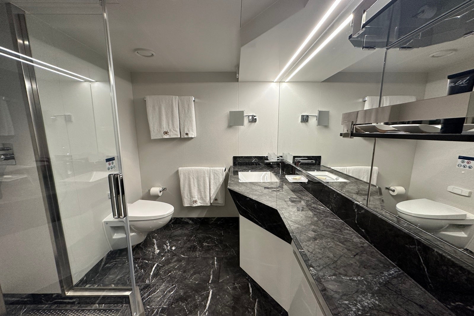 The bathroom in a Deluxe Balcony Suite in the Yacht Club of MSC Cruises' MSC Seascape