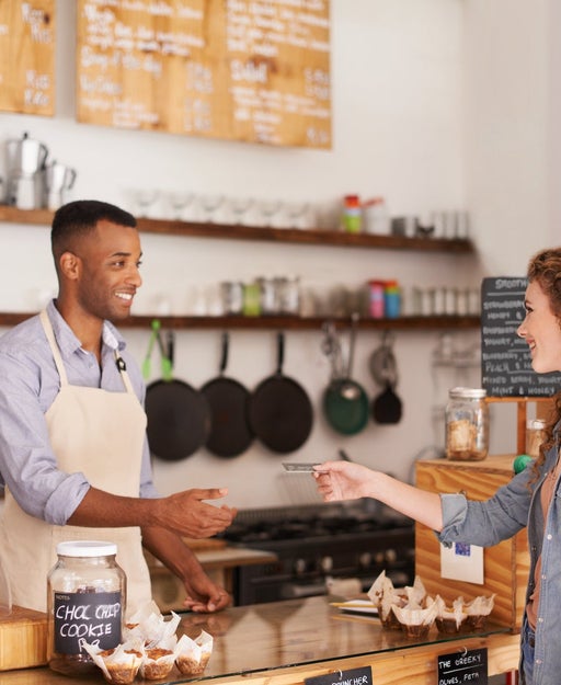 Woman buying something from a cafe
