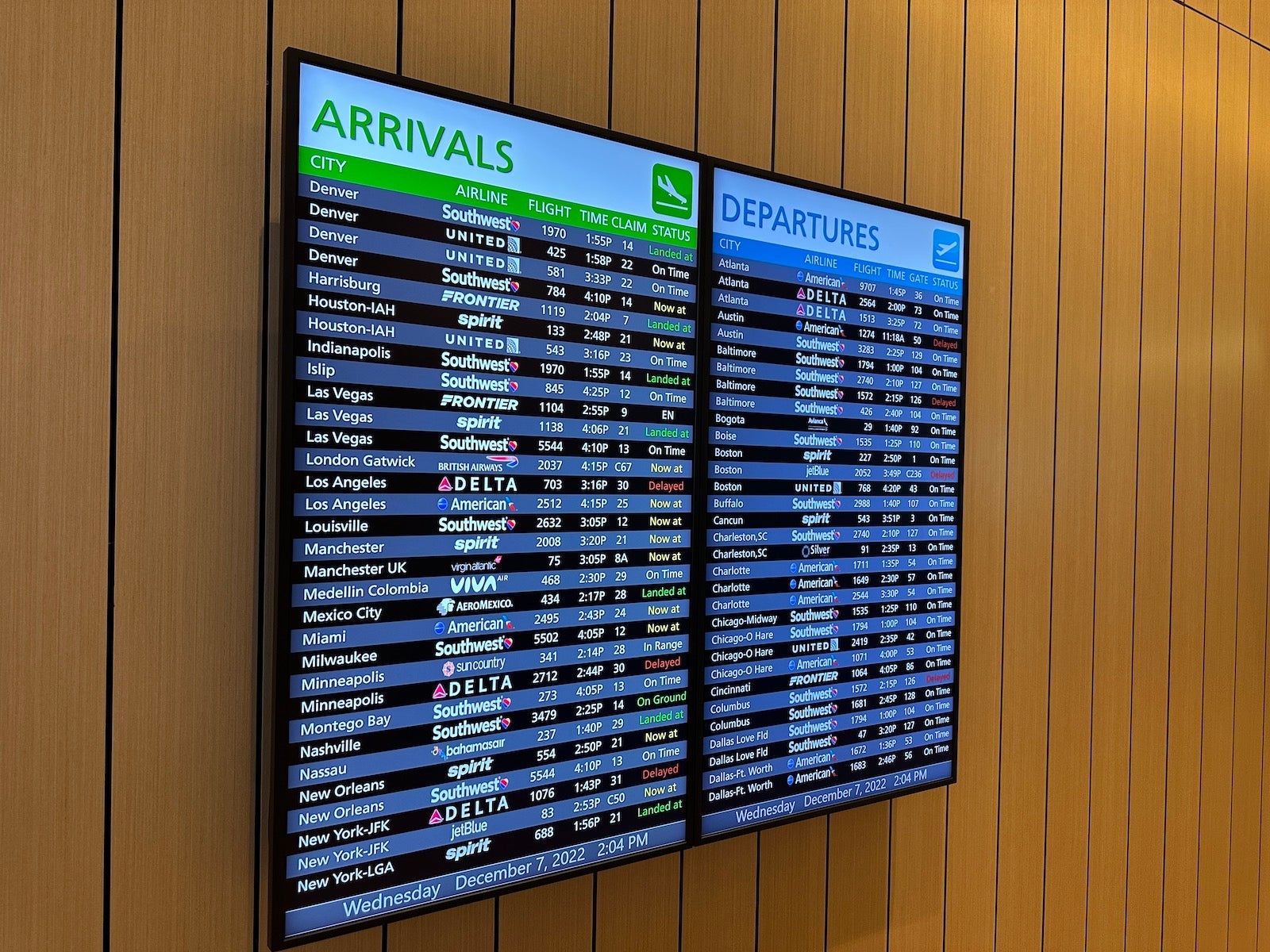 Flight schedule displayed at Plaza Premium Lounge Orlando