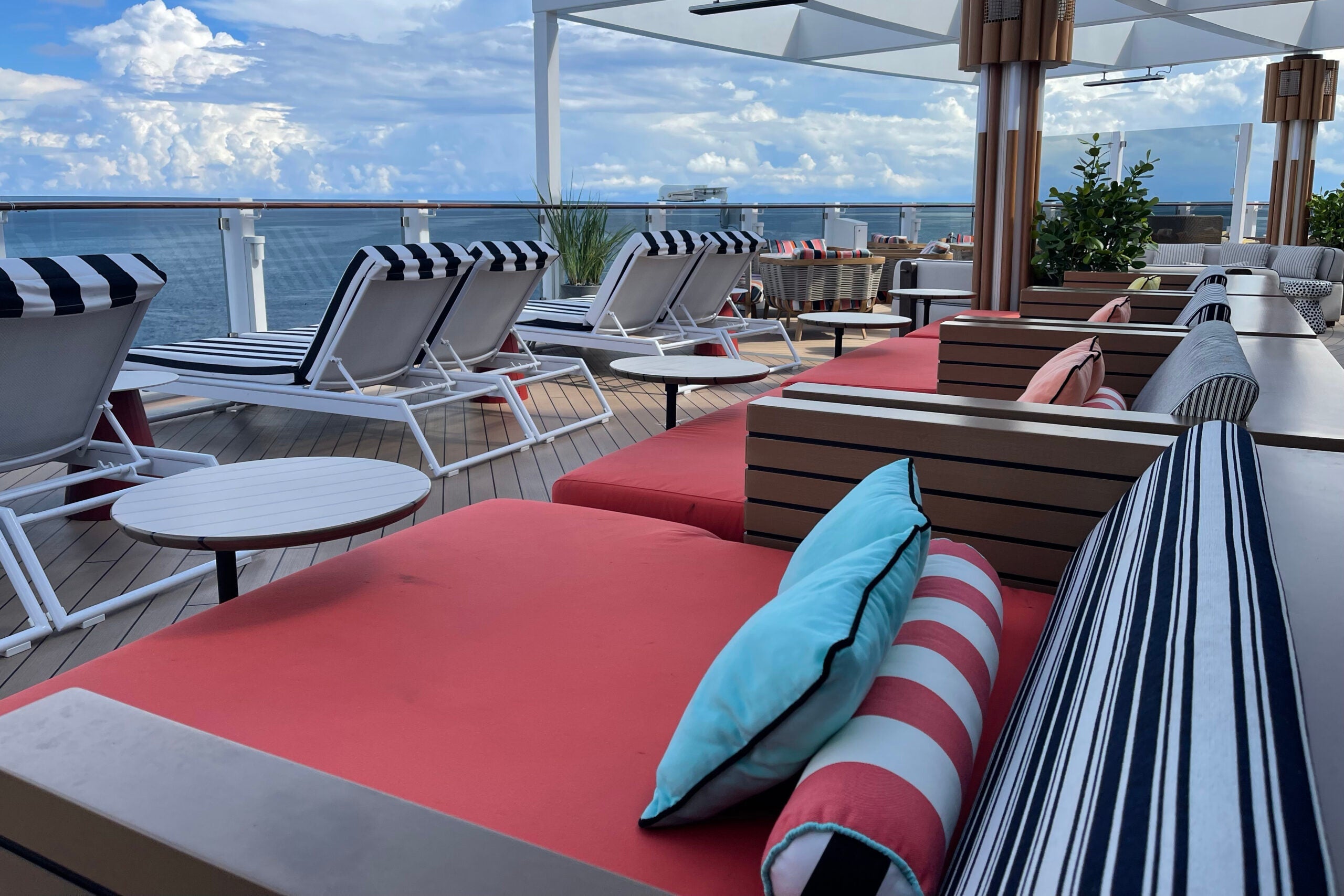 Red sun beds on Norwegian Prima's Deck 8 sundeck