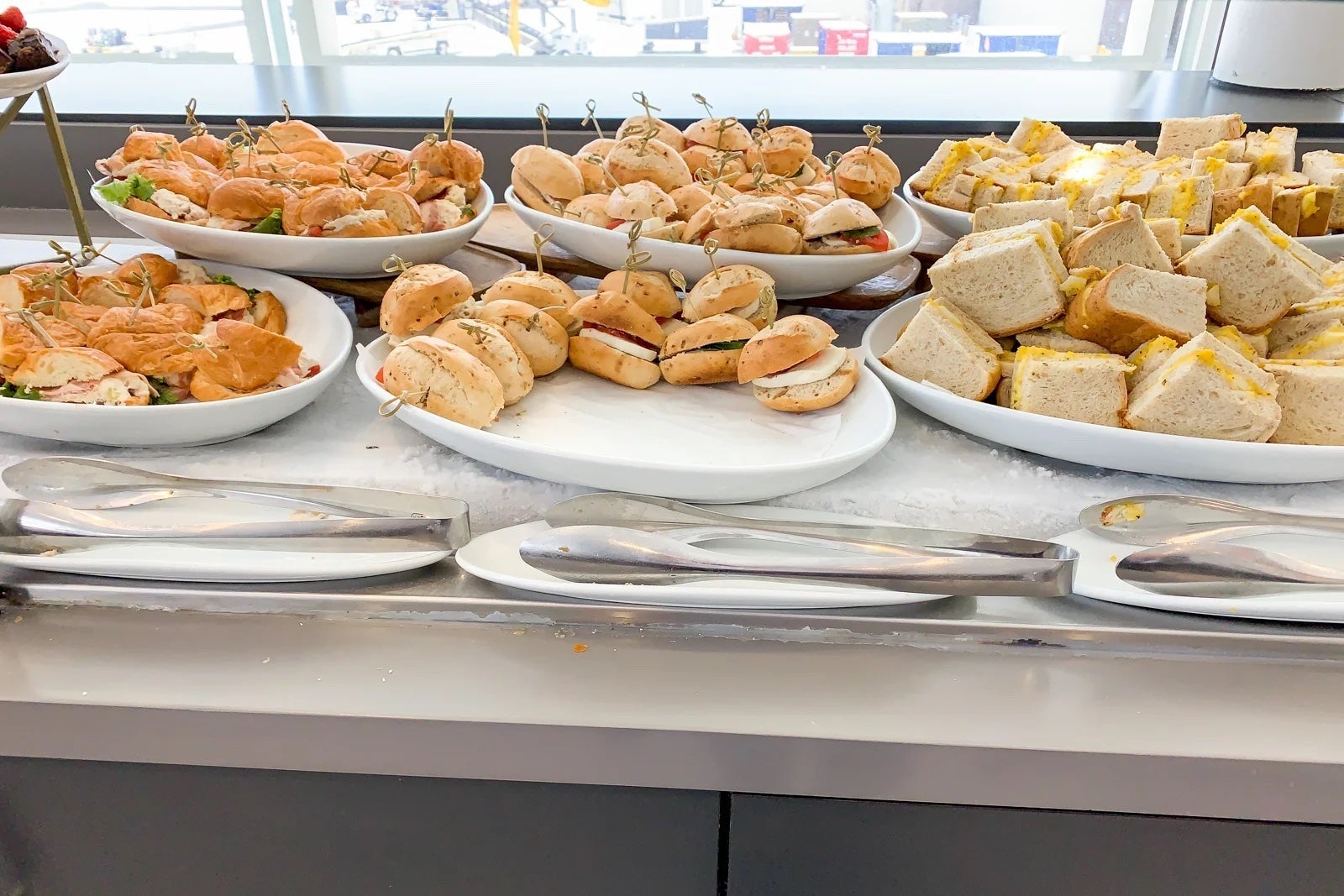 mini sandwiches on a buffet