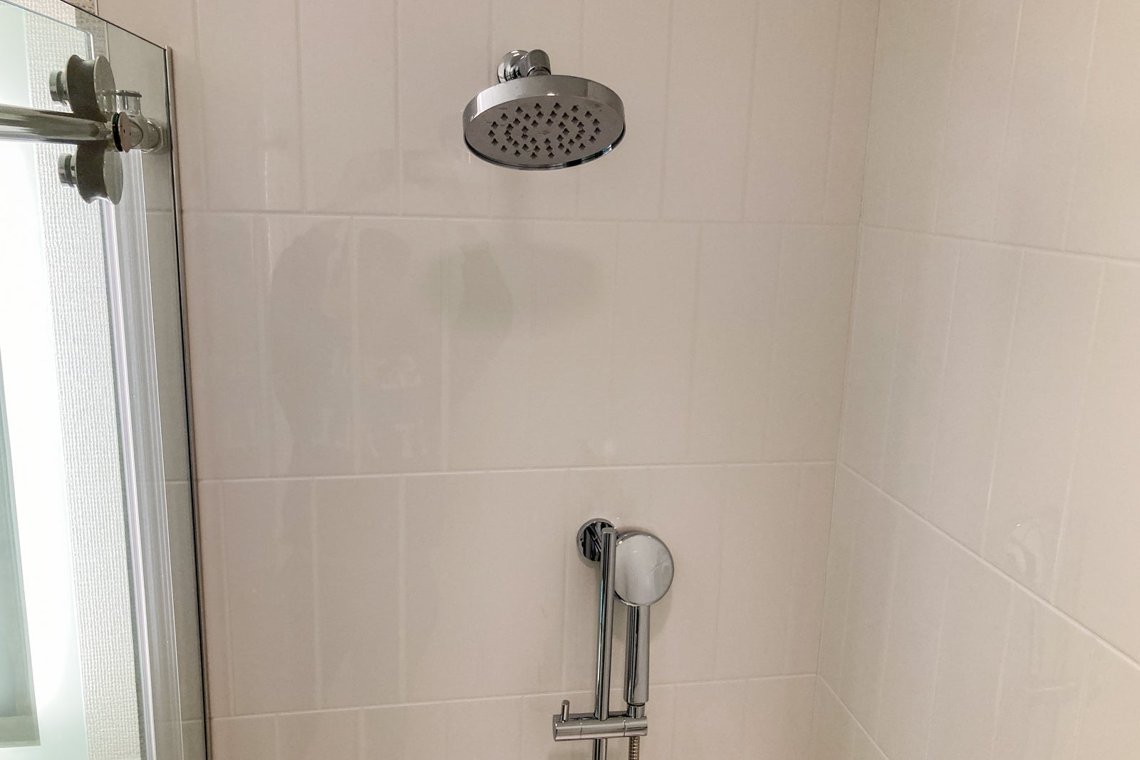 hand-held and rainfall shower head options