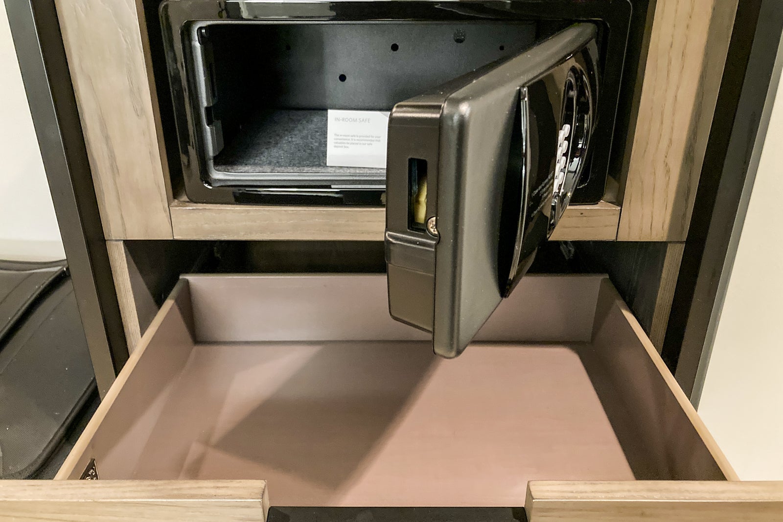 the open door to a hotel room safe