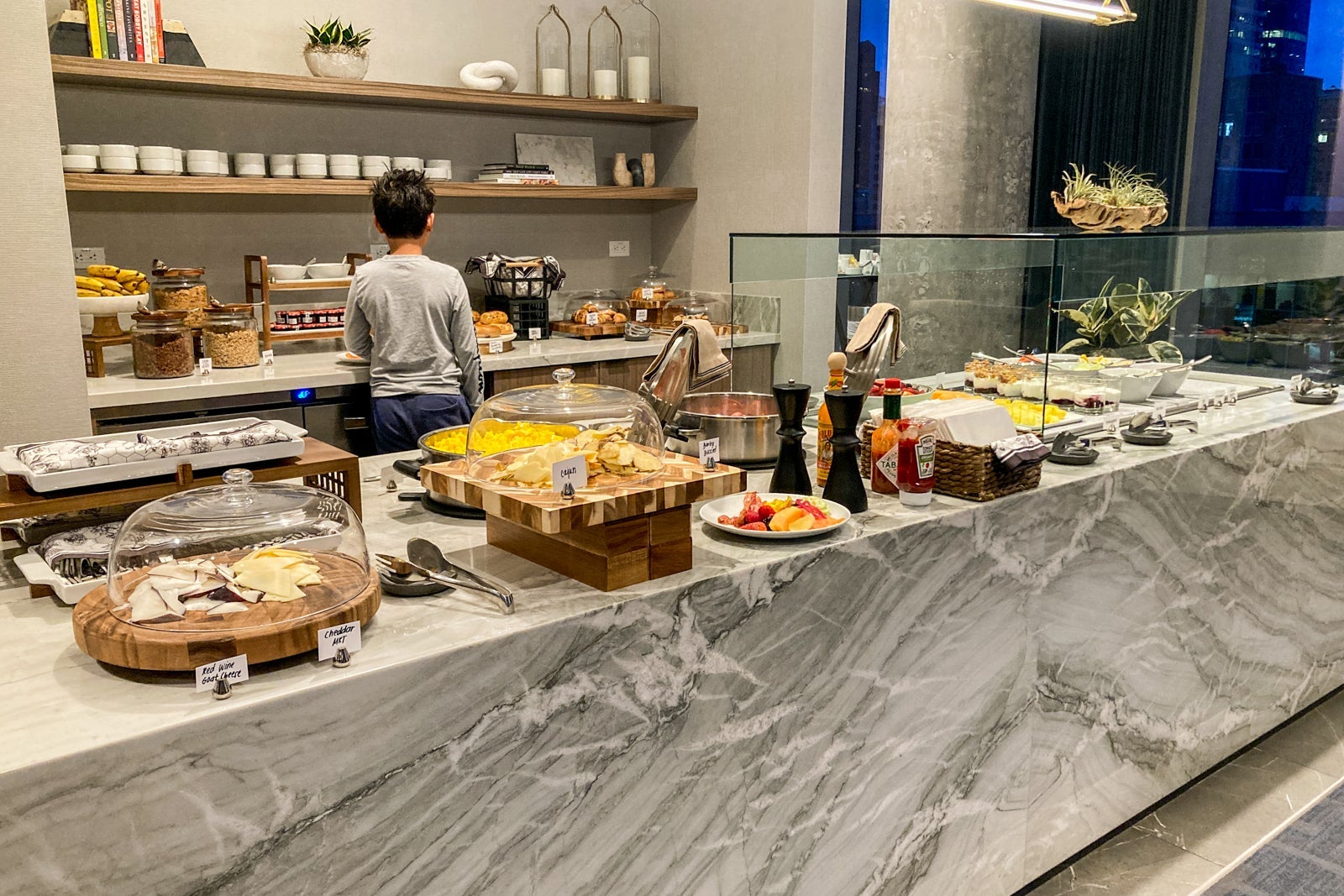 a breakfast buffet in a lounge for elite status members