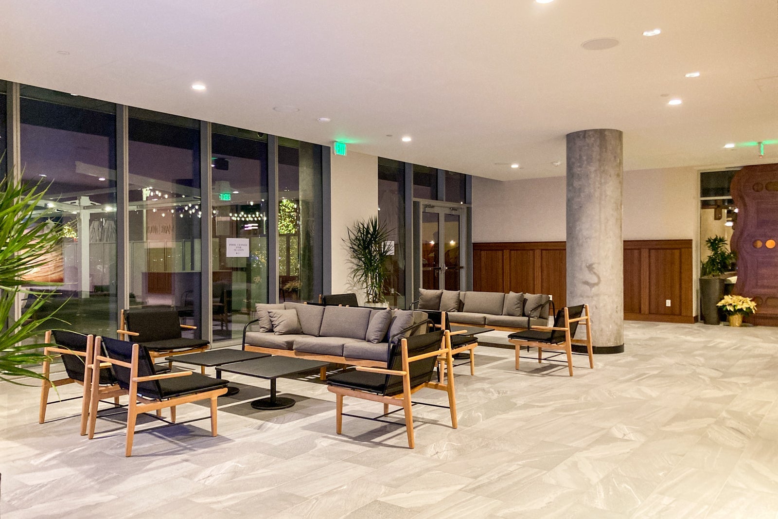 a large seating area with couches and chairs