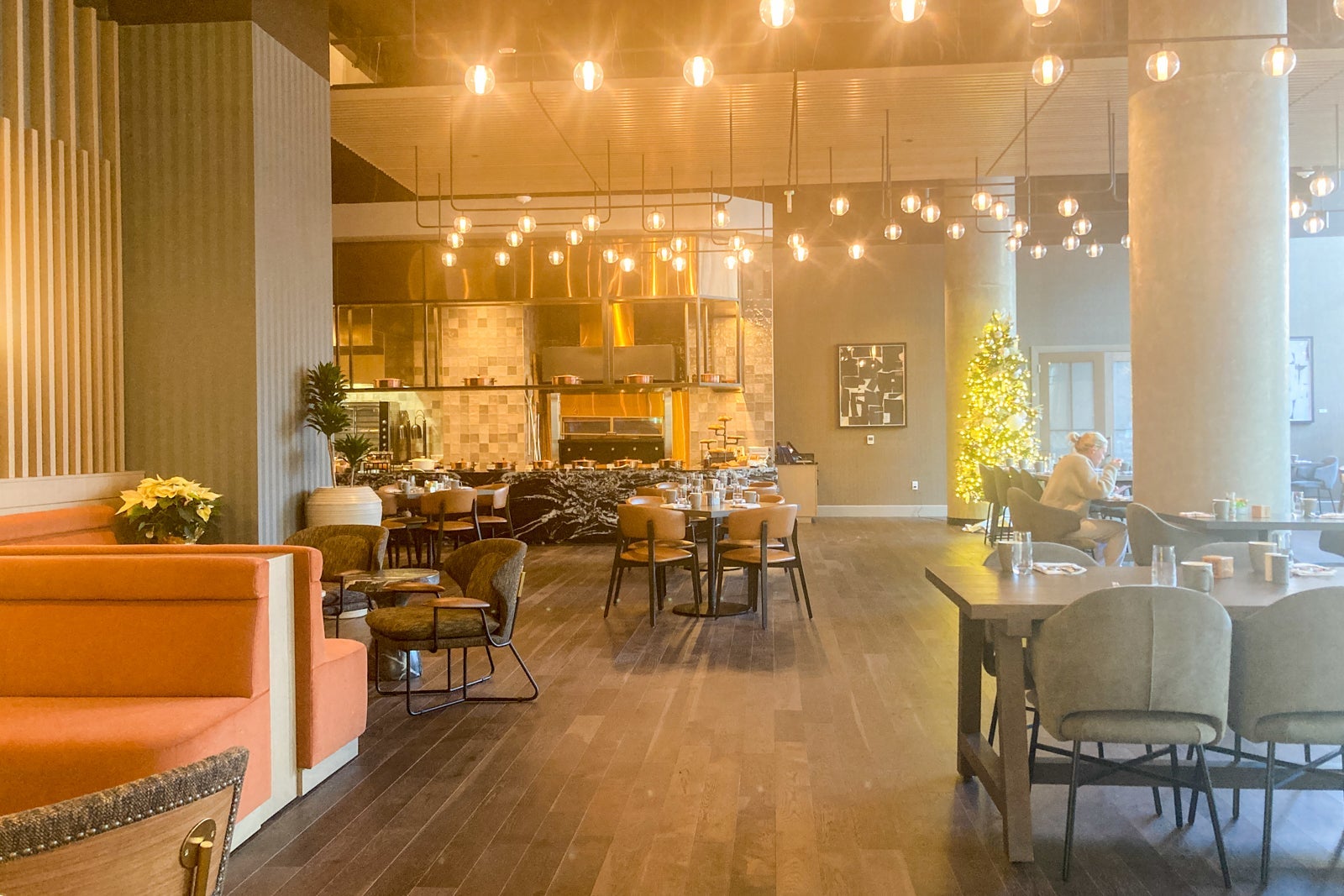 seating areas in a restaurant, it is well lit