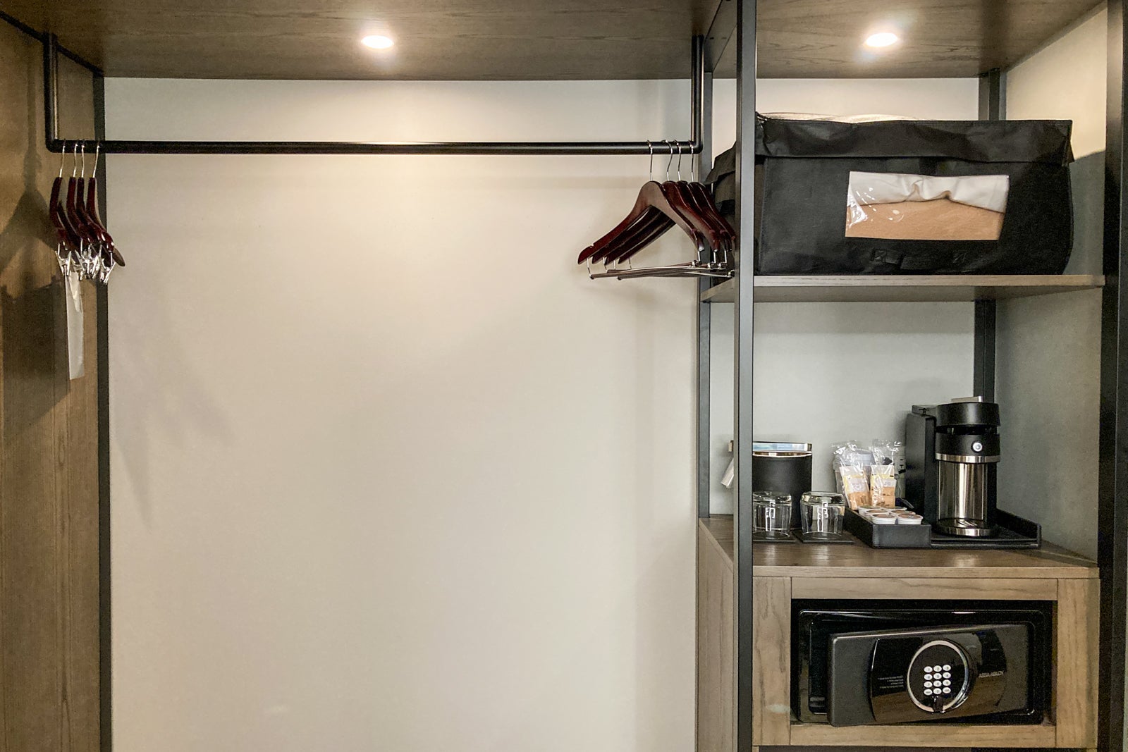 an open closet with hangers