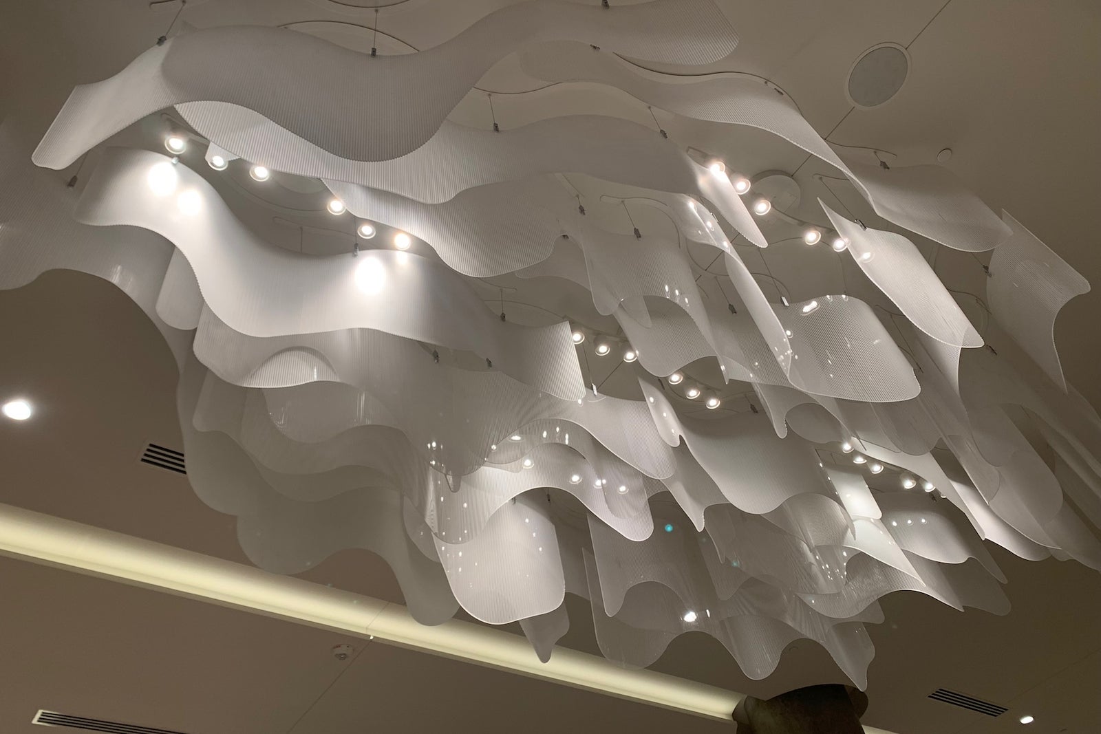 Decorative art on the ceiling of a hotel lobby