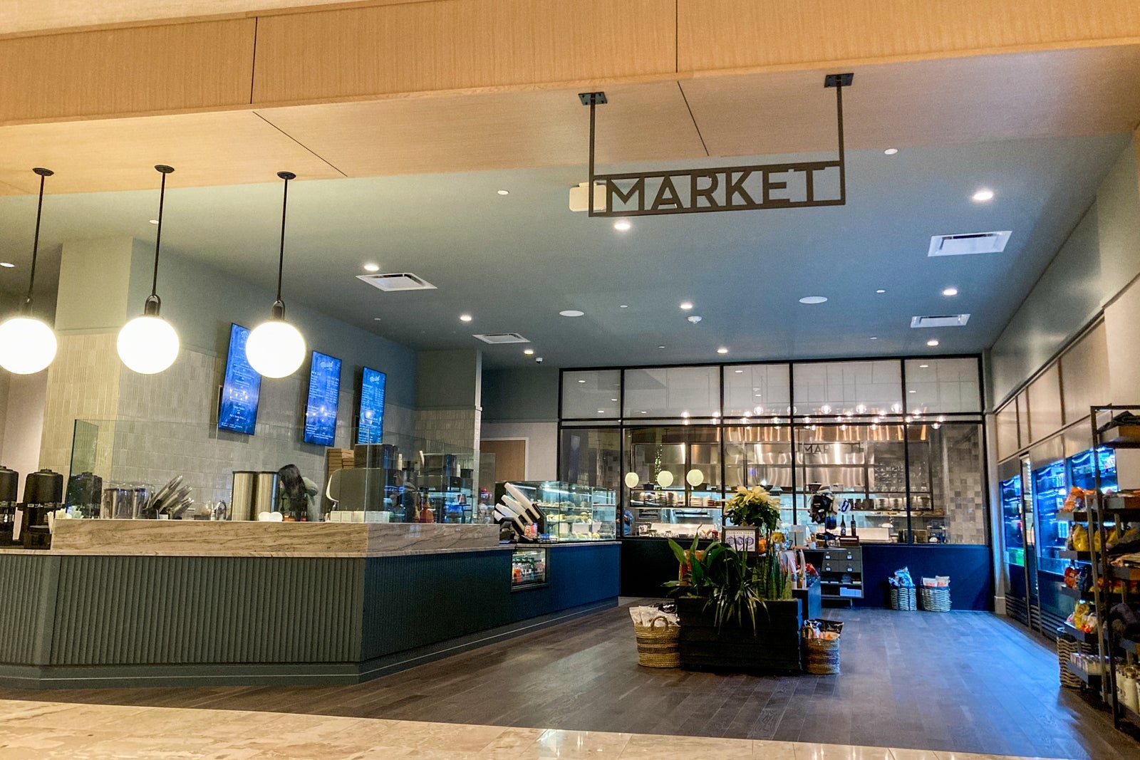 the entrance to a quick-grab market in a hotel lobby