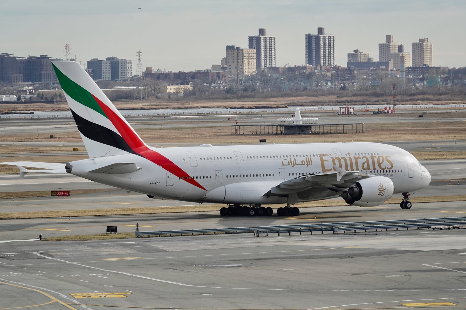 emirates plane on runway