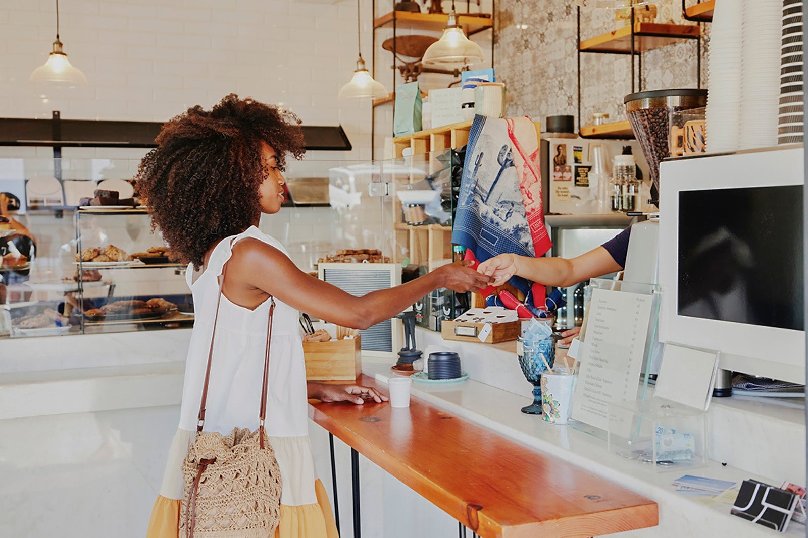 Woman buying coffee