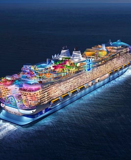 Icon of the Seas lit up at night