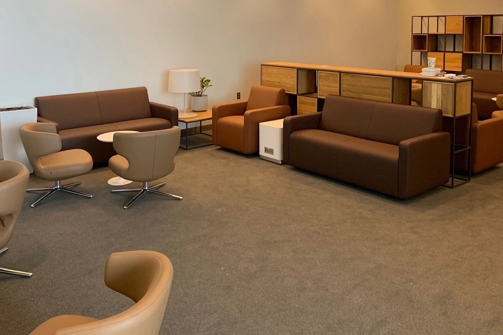 brown leather furniture in an airport lounge