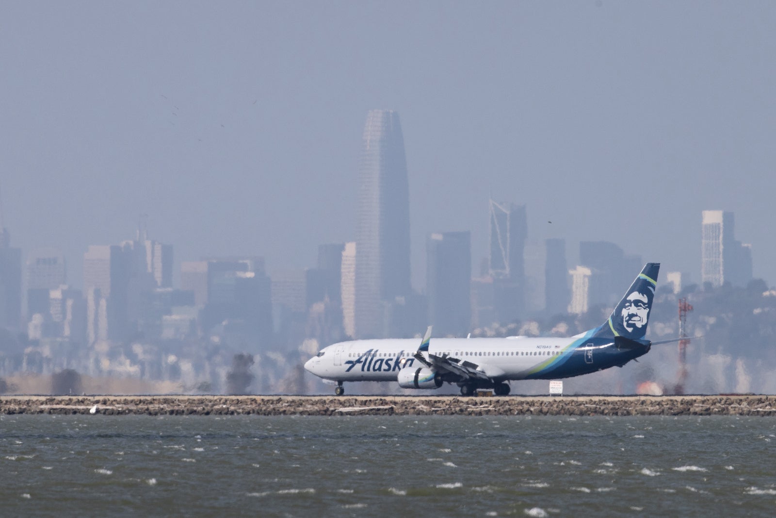 Alaska Airlines plane lands at San Francisco International Airport (SFO)