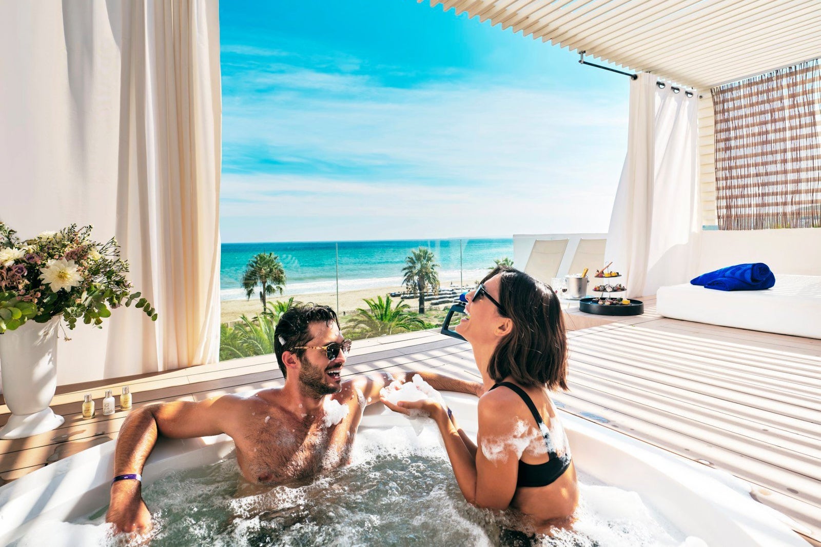two people in hot tub at Grand Palladium White Island Resort
