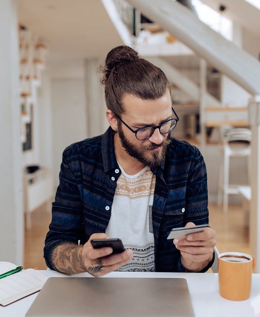 Young man checking his phone