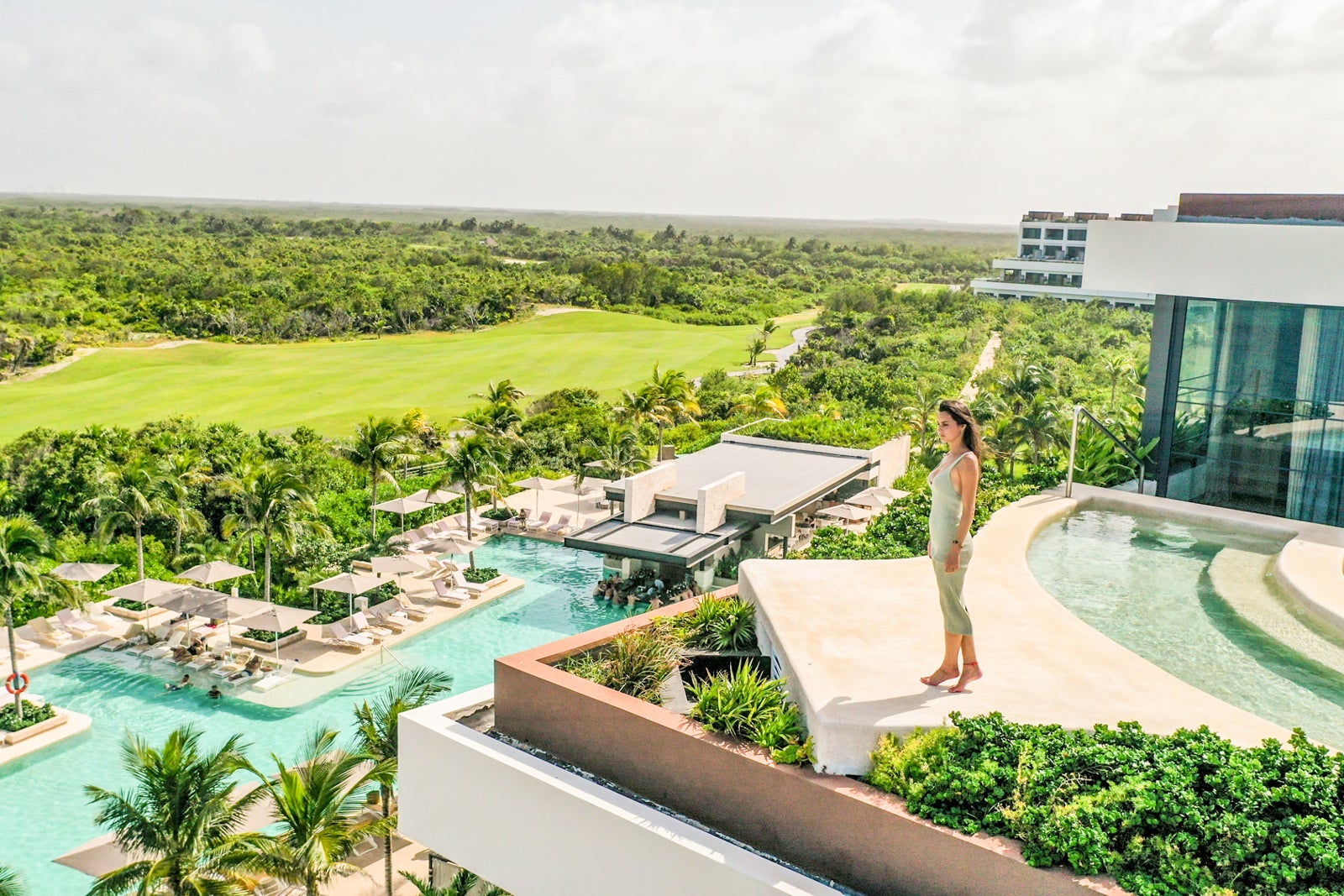 exterior aerial view of swim up pools Atelier Playa Mujeres