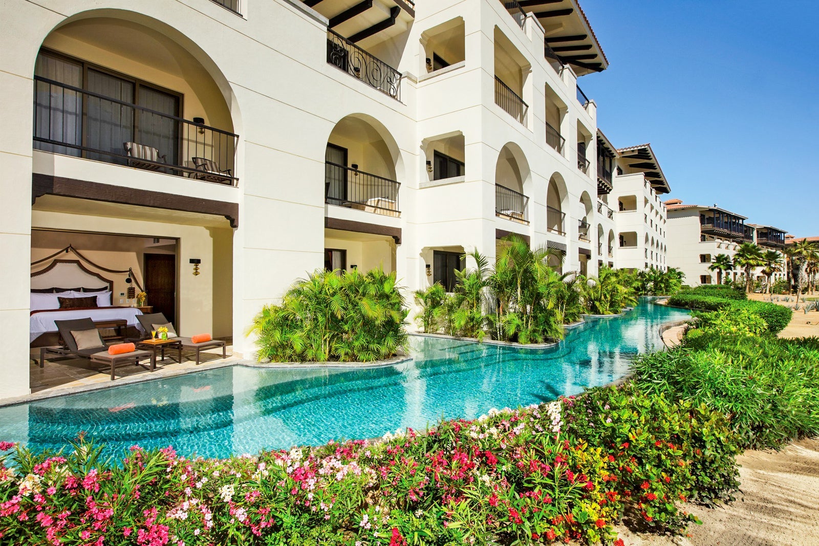 Secrets Los Cabos Exterior view of swim up pools