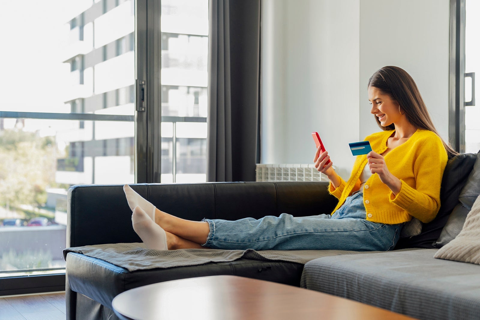 Woman holding a credit card