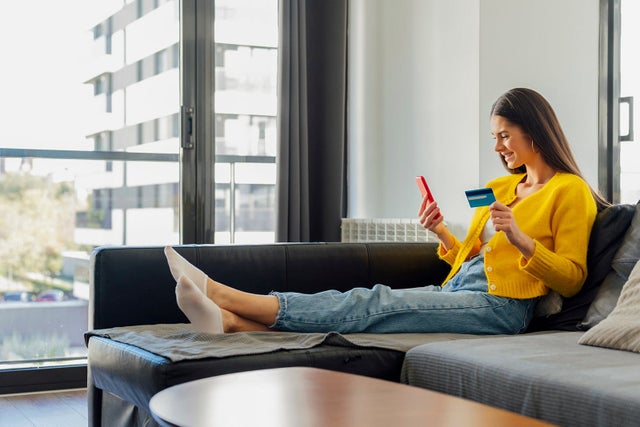 Woman holding a credit card