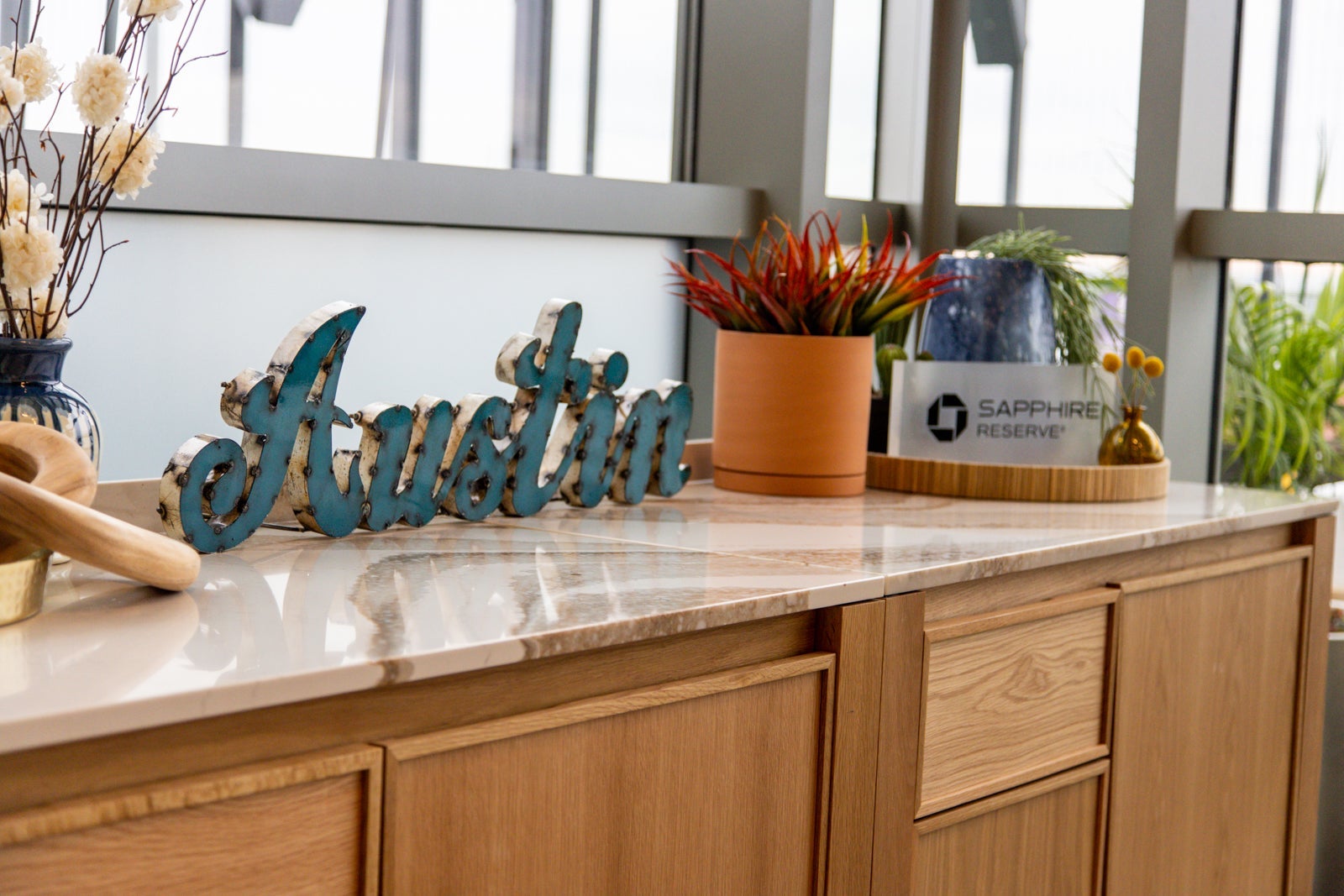 Austin and Chase Sapphire signage on a desk
