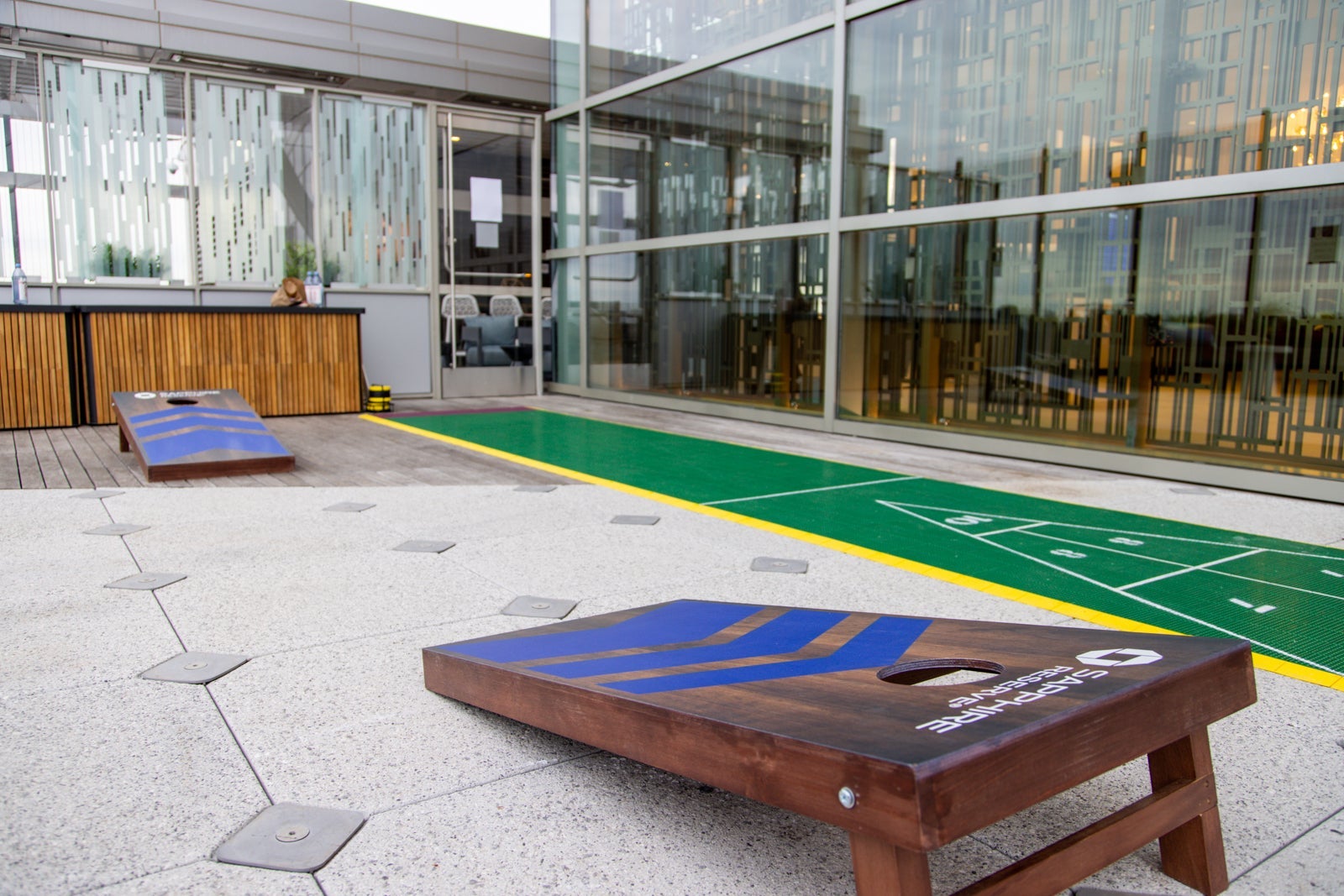 cornhole (beanbag toss) sits ready for people to use it