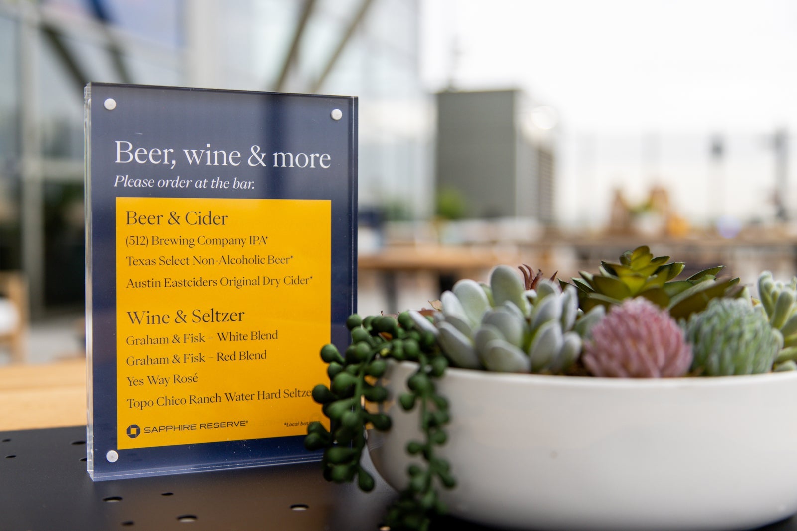 a sign listing available non-alcoholic drinks