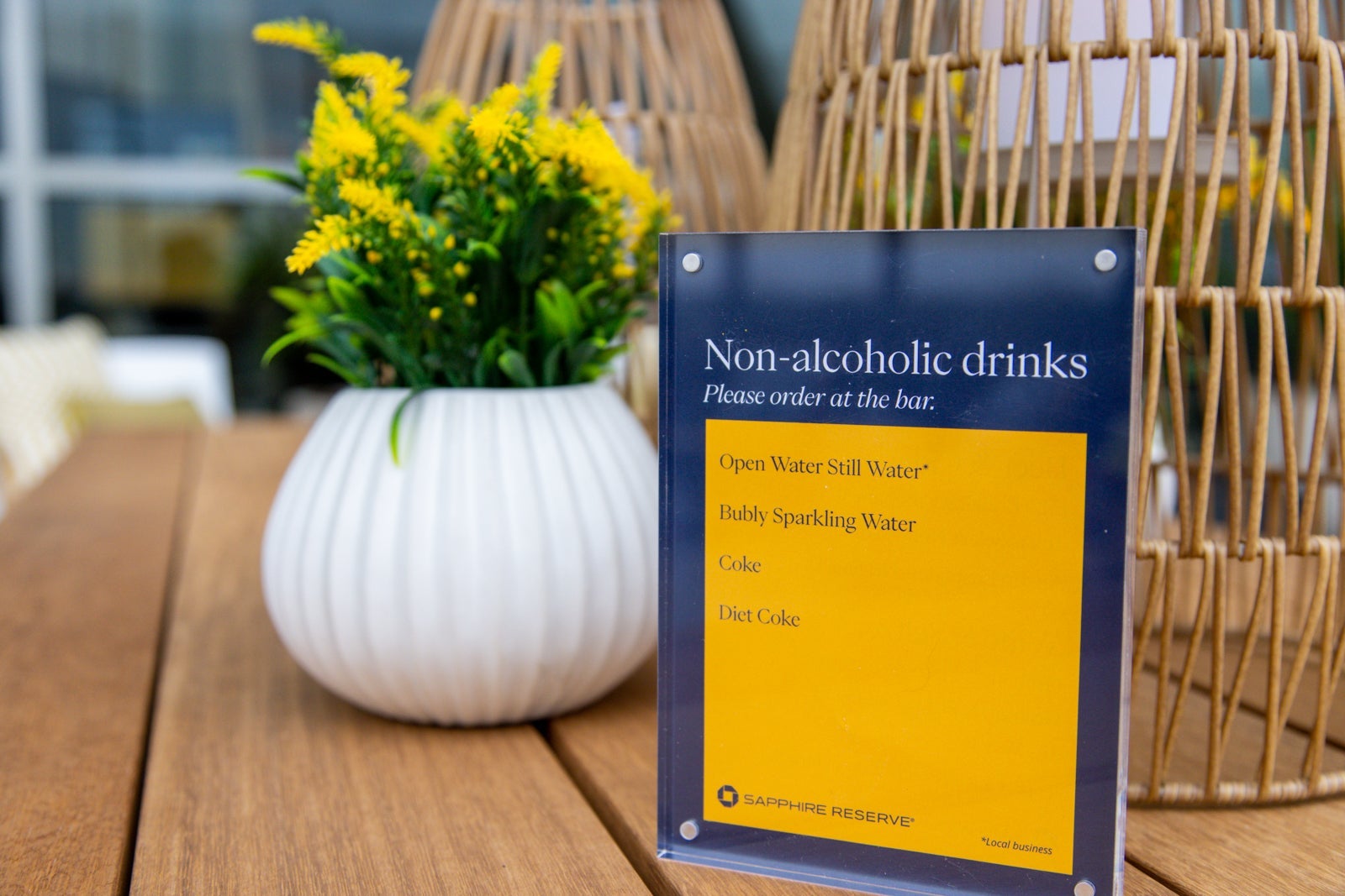 a sign listing available alcoholic drinks