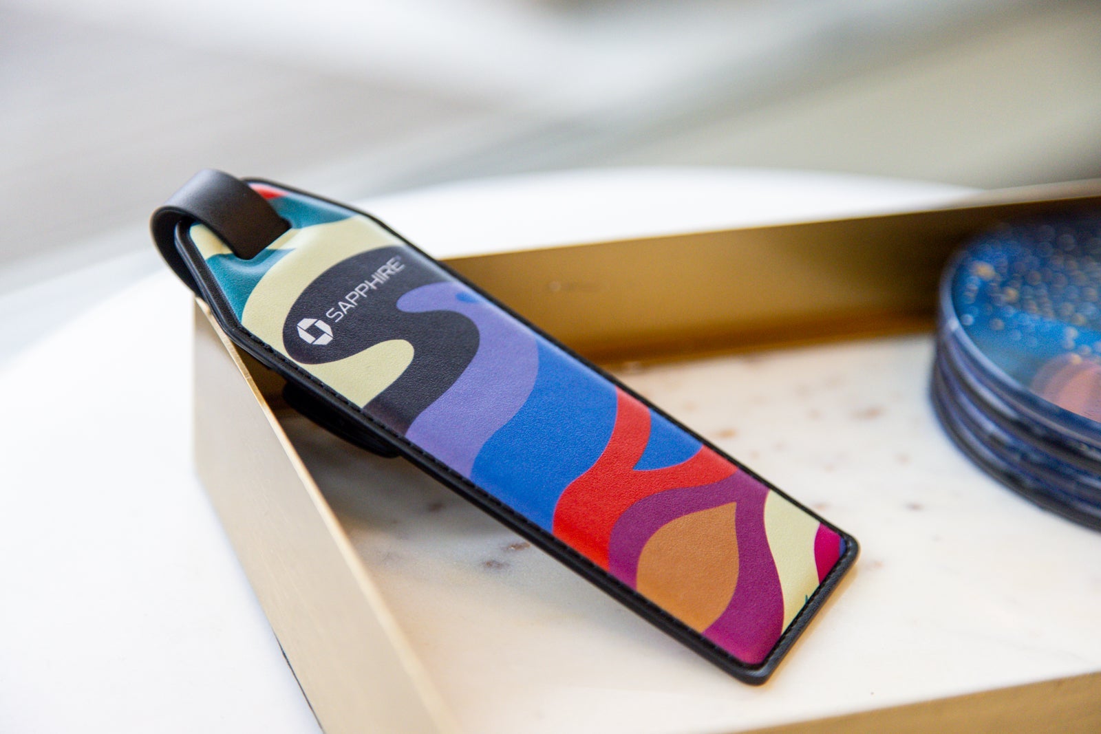 a multi-colored bottle opener