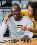 Couple booking a flight