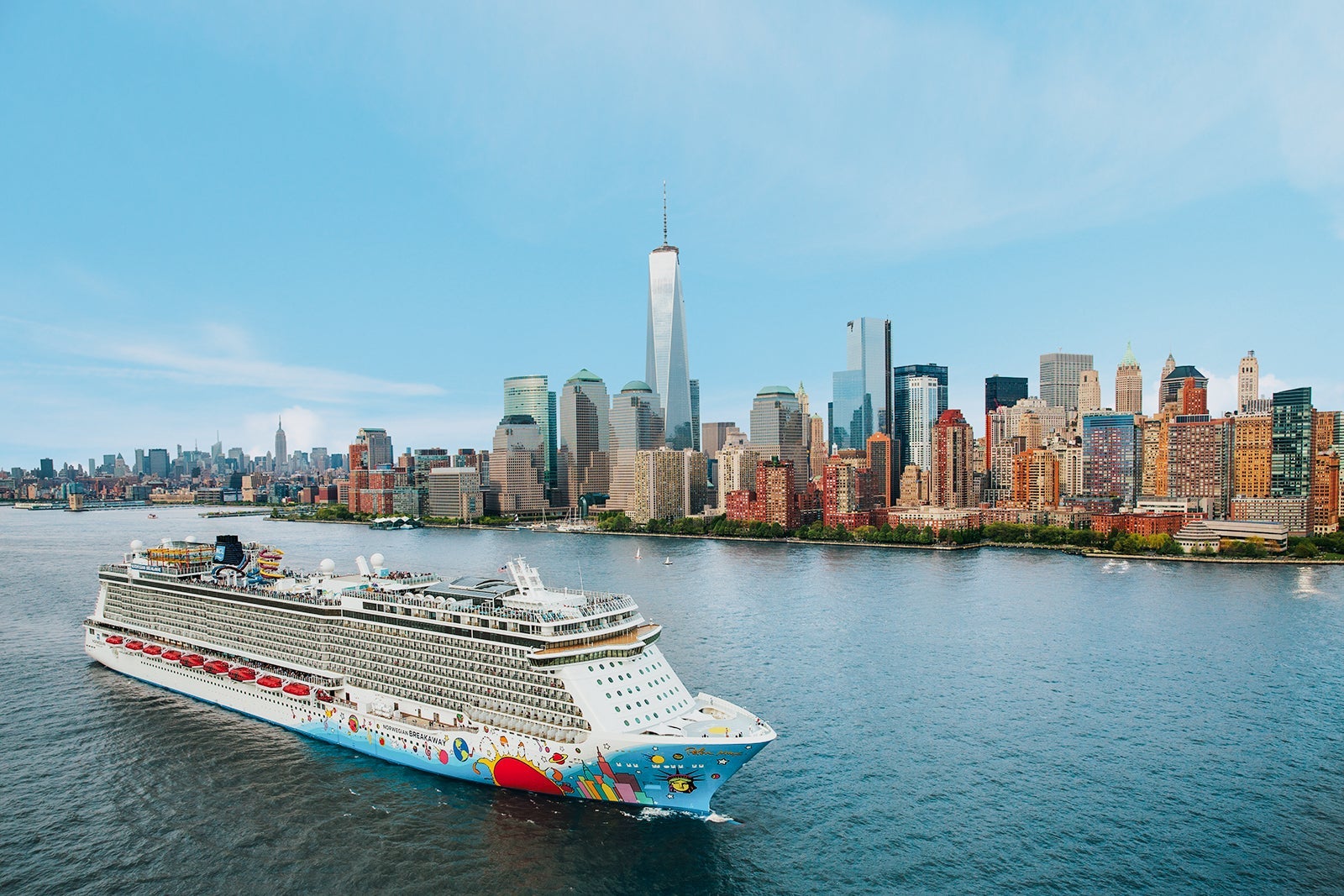 Norwegian Breakaway cruise ship in Canada with a city scape in the background
