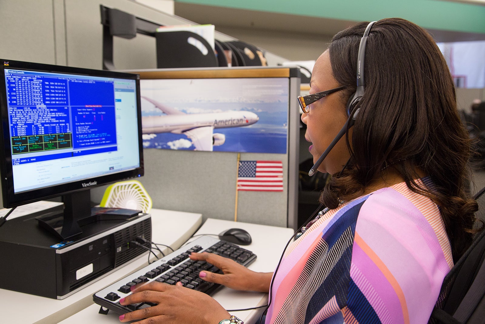 American Airlines agent at a desk