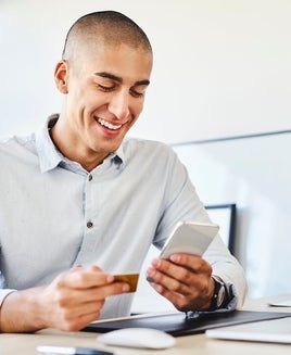 Man using his laptop to book travel