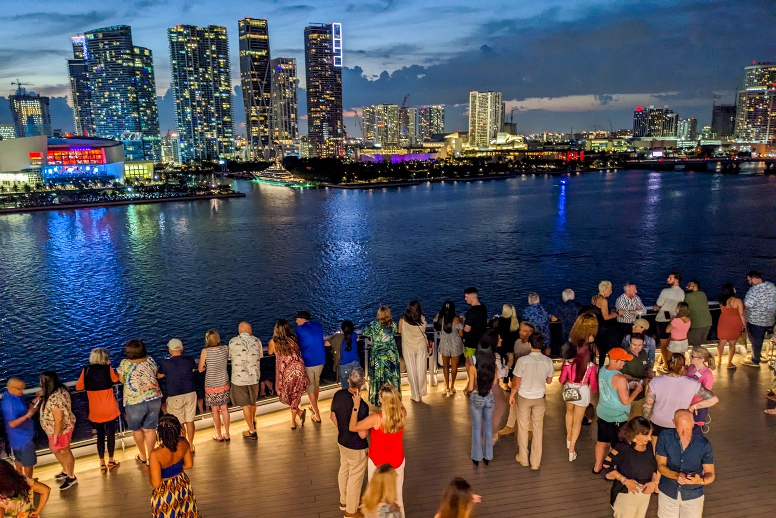 Passengers watching drone show before the sailing of Scarlet Lady of Virgin Voyages