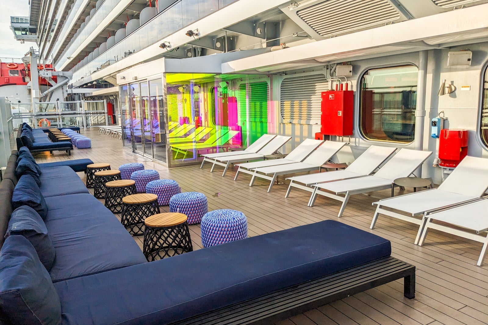 Deck with lounge chairs on cruise ship