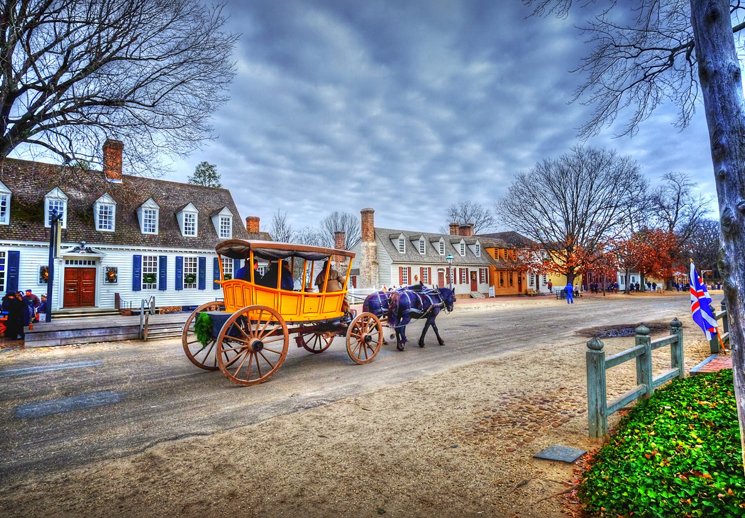 Colonial Williamsburg, in Virginia, is a wonderful place to visit near Christmas. Beautiful and historic Christmas decorations are all around and the Christmas carols sung after the Fife and Drum march tops off visit!