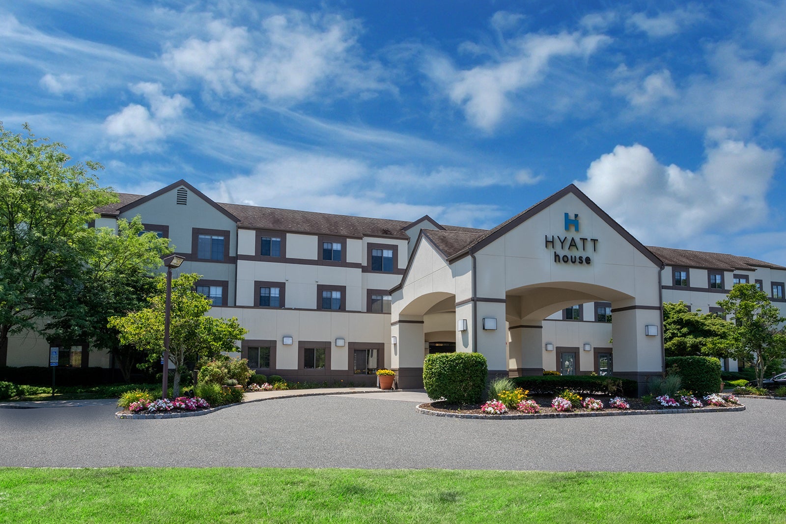 exterior of Hyatt House in spring