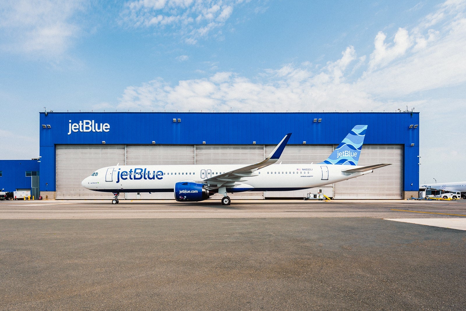 JetBlue plane near hangar