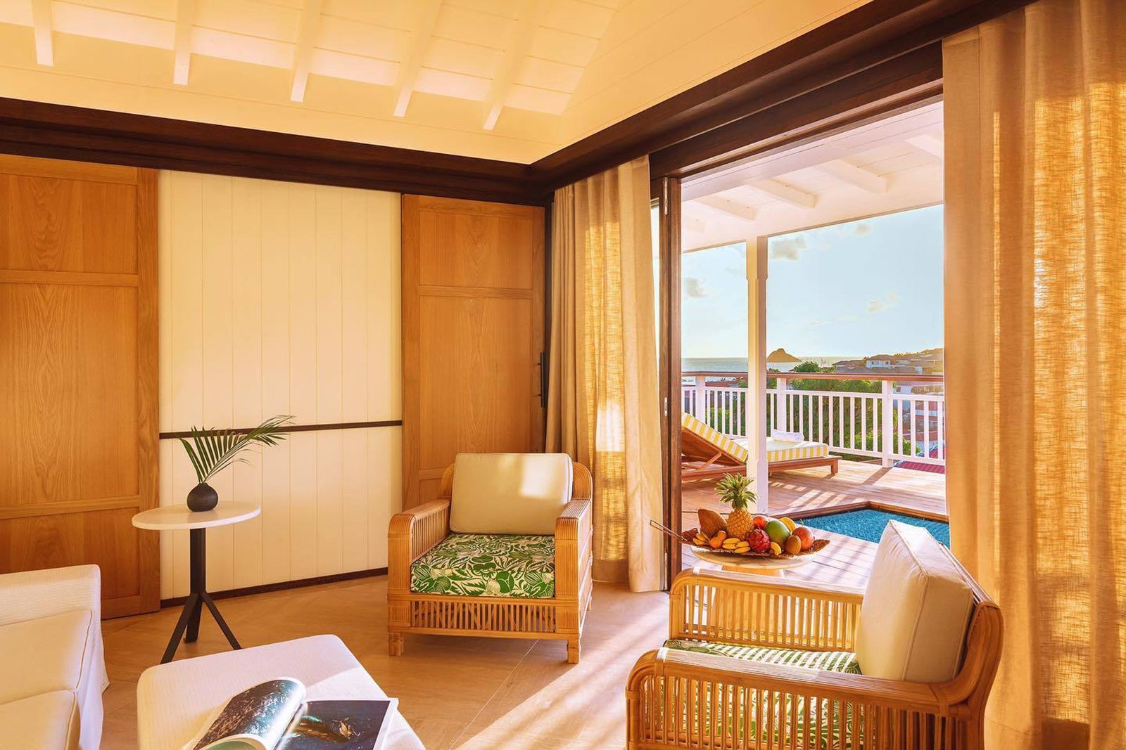 A hotel room with a balcony 