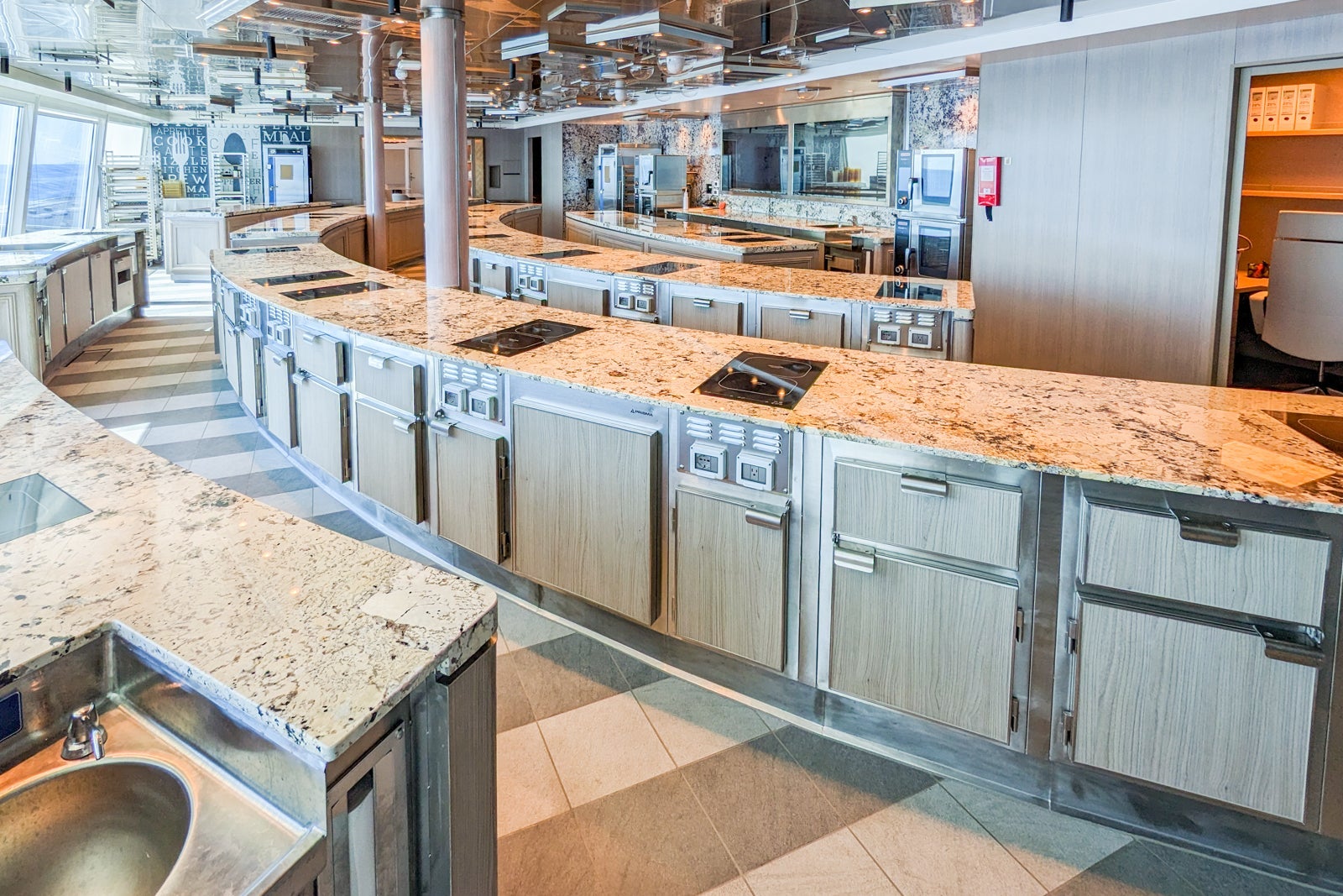 Rows of cooking stations on a cruise ship