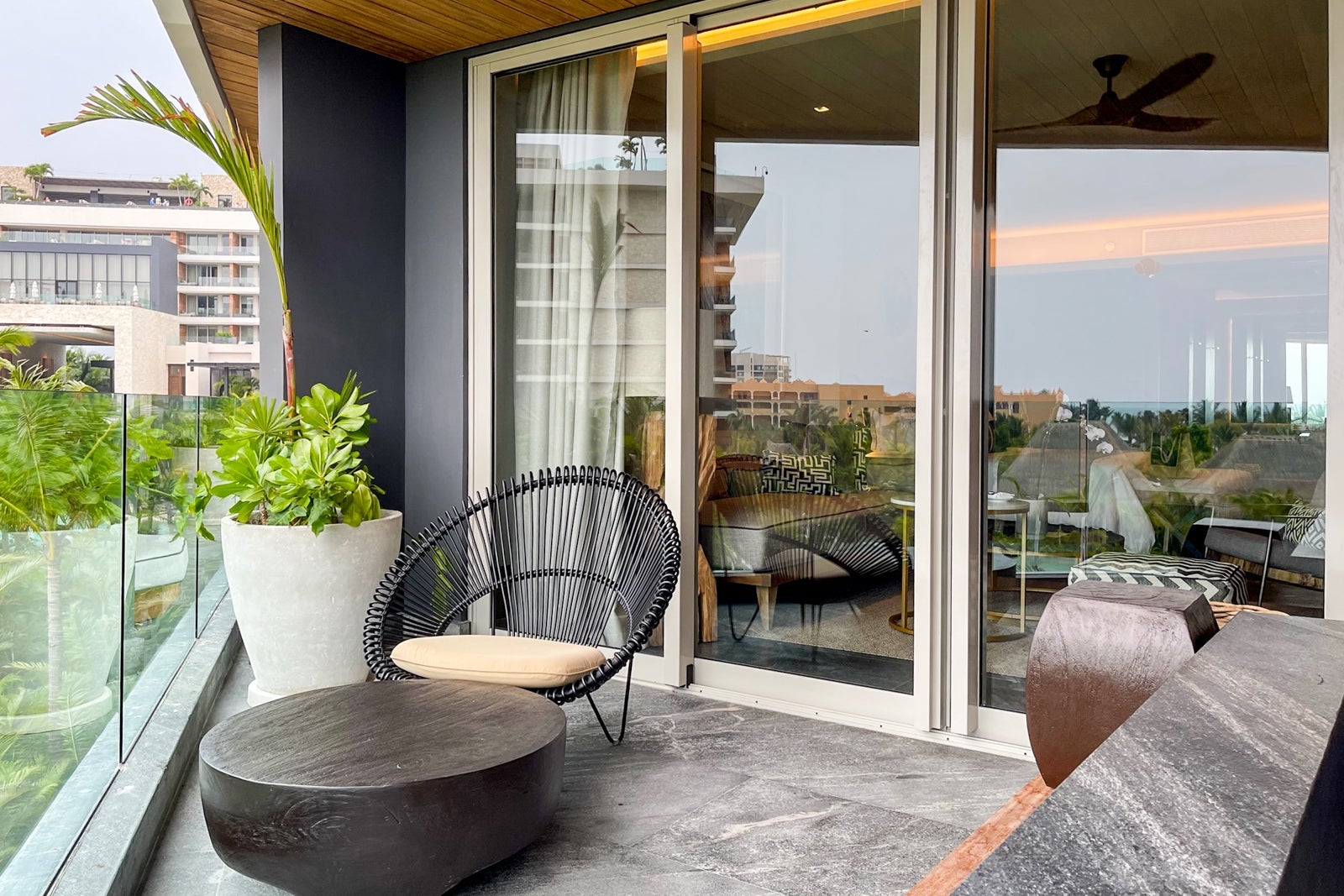 Seating on the Signature Suite balcony at Secrets Impression Moxche