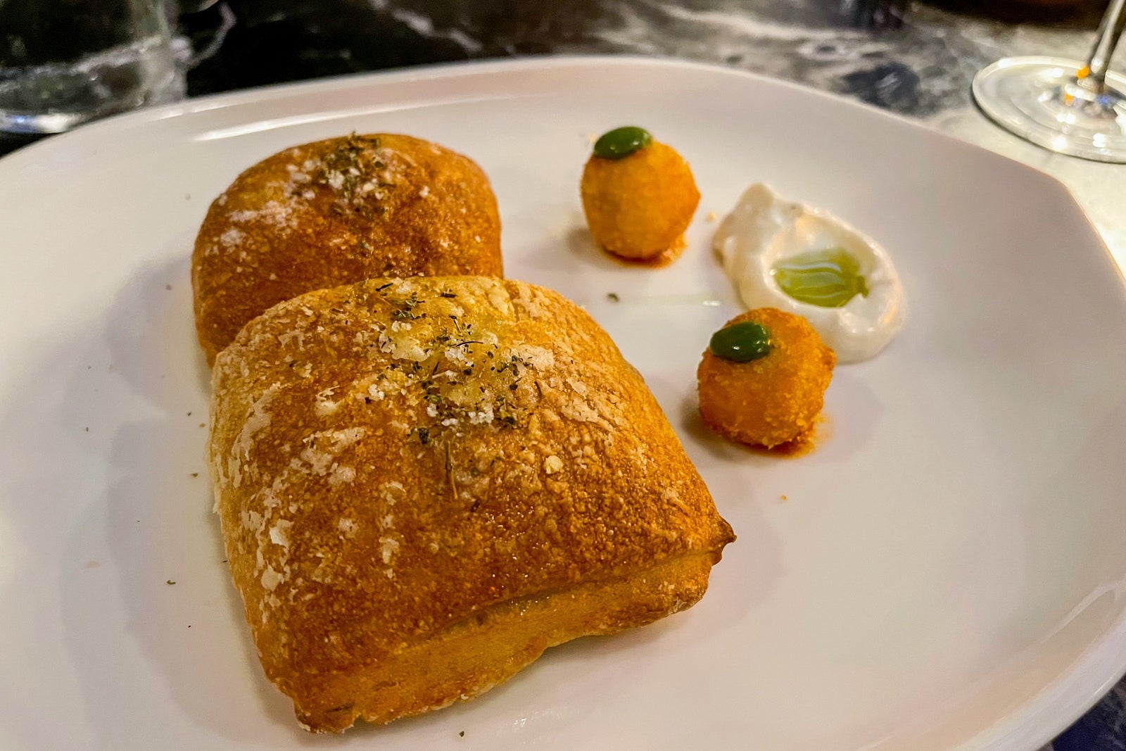 Bread and arancini at Allora Secrets Impression Moxche Playa del Carmen