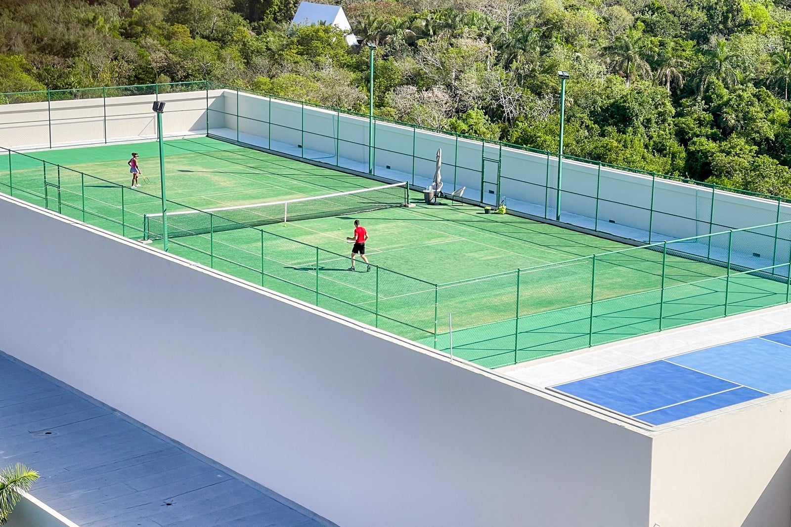 Tennis court at Secrets Moxche Playa del Carmen.