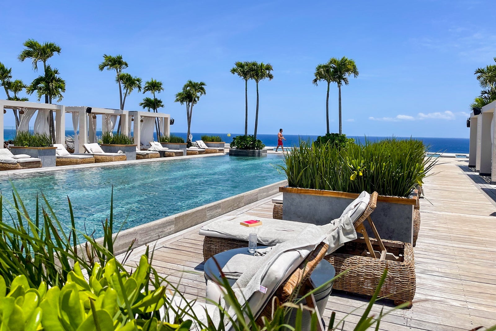 VIP rooftop pool, loungers and cabanas at Secrets Impression Moxche Playa del Carmen