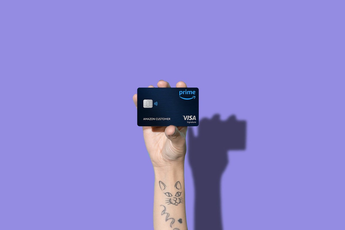 hand holding the Amazon Visa credit card