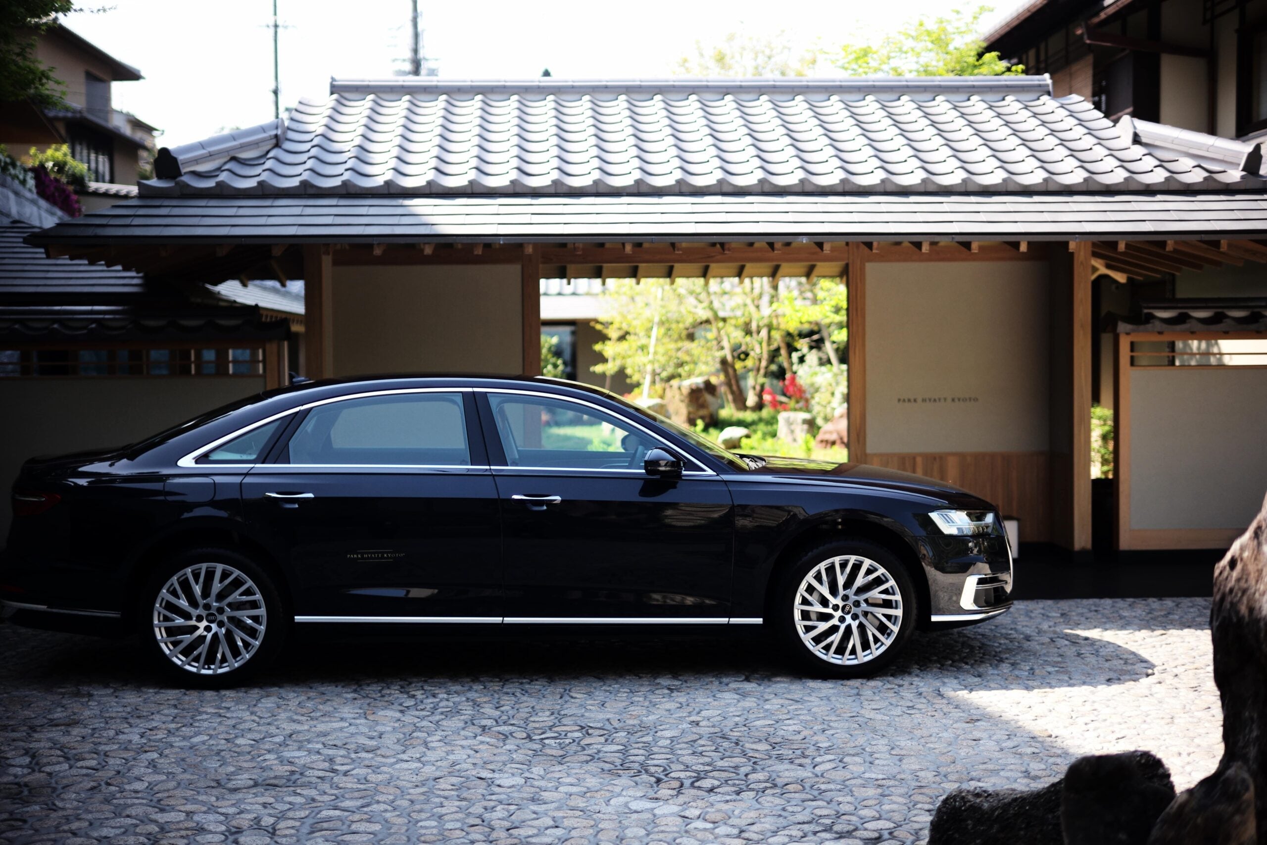 black sedan in front of Park Hyatt Kyoto